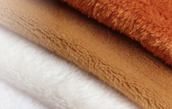 Polyester fabric types flannel fabric is perfect for making soft-touched and warm-to-wear textiles, such as hoodies, blankets, sweaters, jackets, and furniture