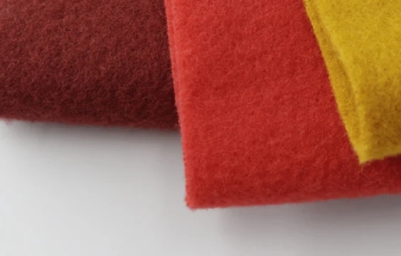 Polyester fabric types Fleece fabric is made by brushing the polyester fabric to create a fuzzy surface, lightweight and warm